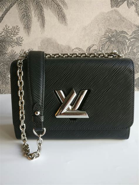 lv twisted box|Twist: LV Brand Mark Twist Lock Handbags .